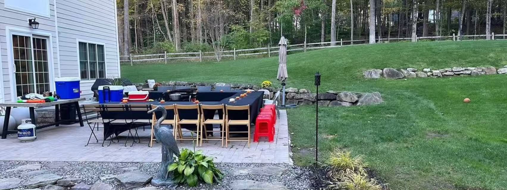 Empty backyard hibachi grill station set up for a party